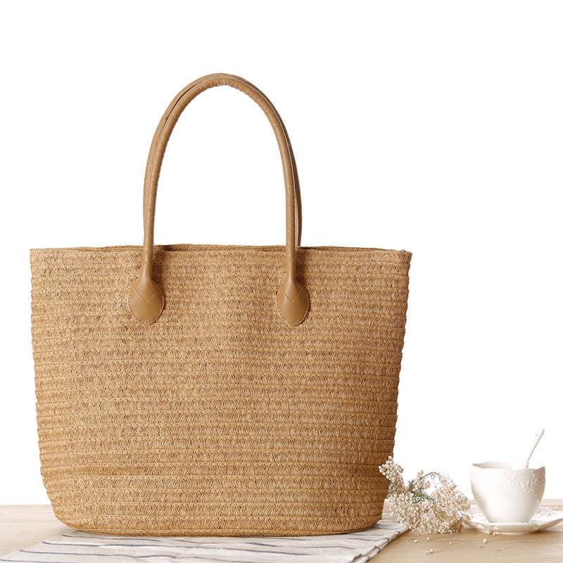 Spacious straw shopper with leather carrying handles Bowlift