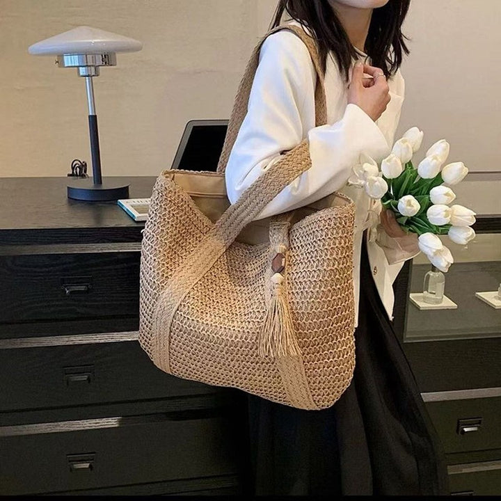 Braided beach bag with fringe detail Bowlift