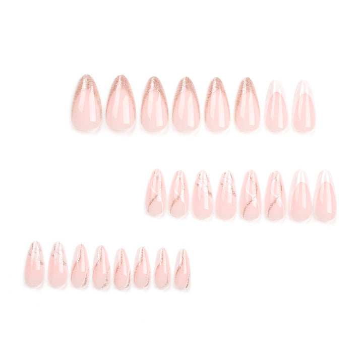 Artful stiletto nails with elegant marble and glitter design Bowlift
