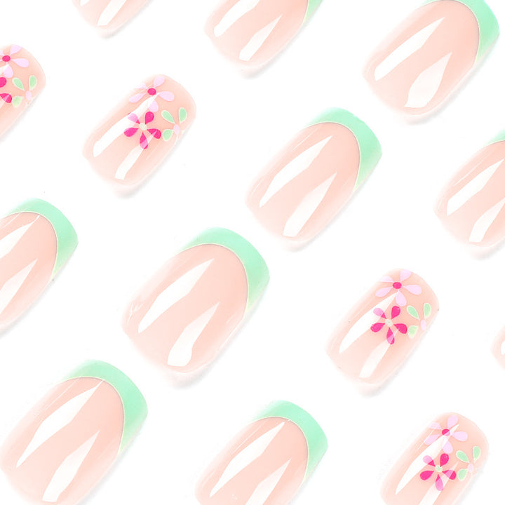 Artificial nails with floral accents and neon tips Bowlift