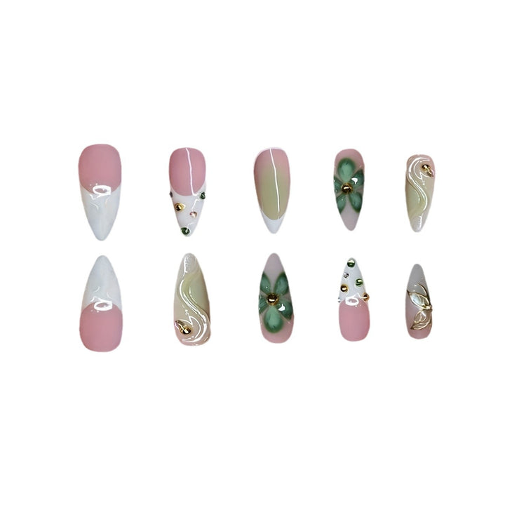 Artistic Press-On Nail Design with Floral Elements Bowlift