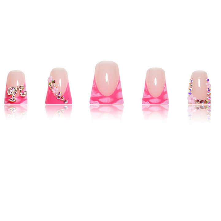 Artistic Press-On Nail Extensions with Rhinestone Accents Bowlift
