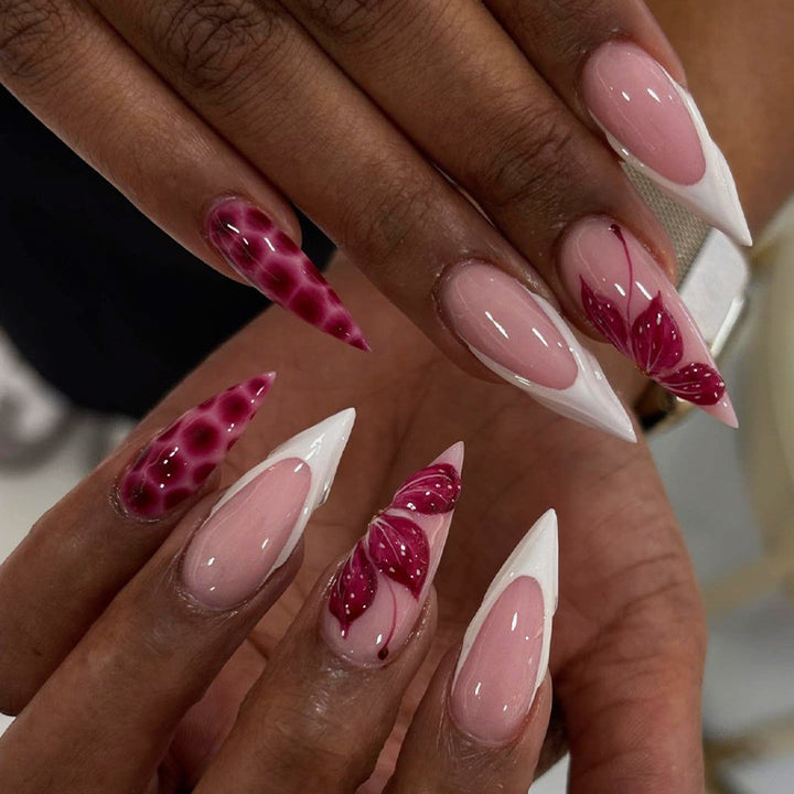 Artificial nail creations with creative patterns and glitter accents Bowlift