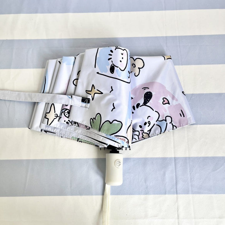 Ladies folding umbrella with playful Pochacco design Bowlift