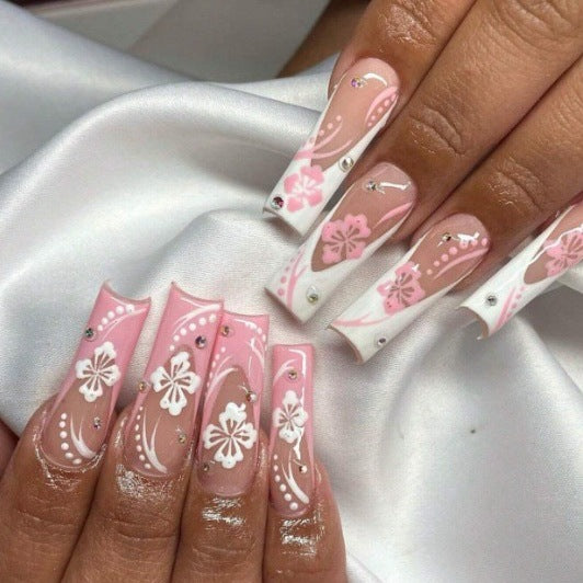Art nail set with elegant flower design and crystal embellishments Bowlift