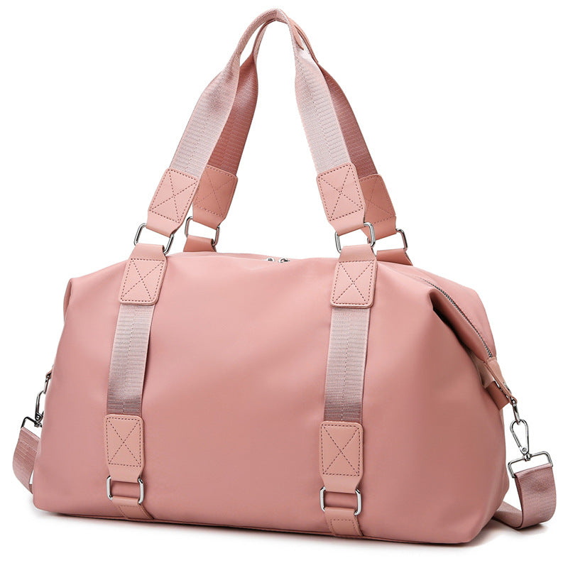 Sports bag with ergonomic carrying handles and versatile interior Bowlift
