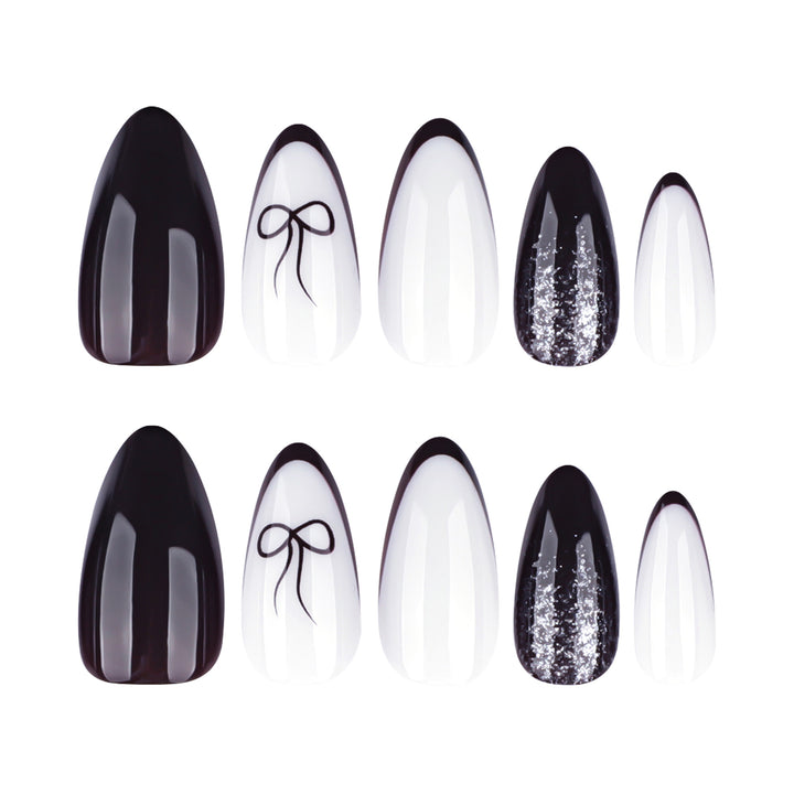 Artful nail art with elegant bow pattern and glitter accents Bowlift