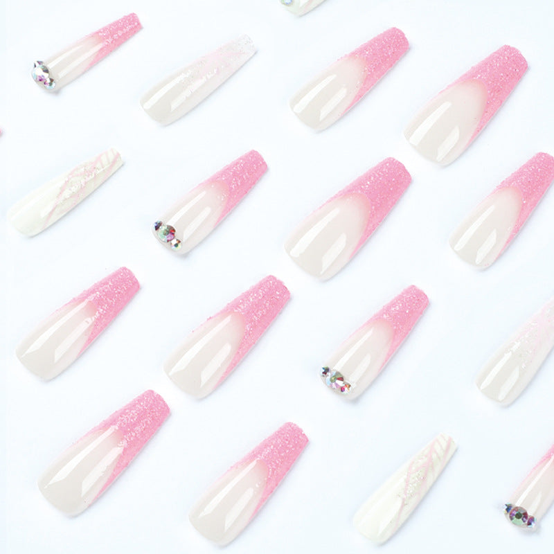 Artistic stiletto nails with glitter and snowflake design Bowlift
