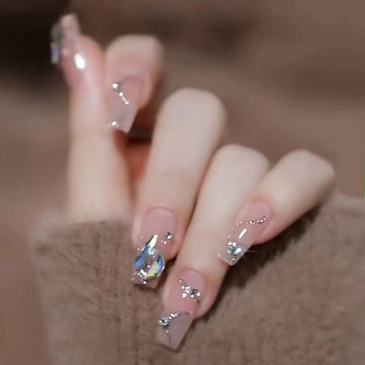 Glamorous artificial nails with glitter accents Bowlift