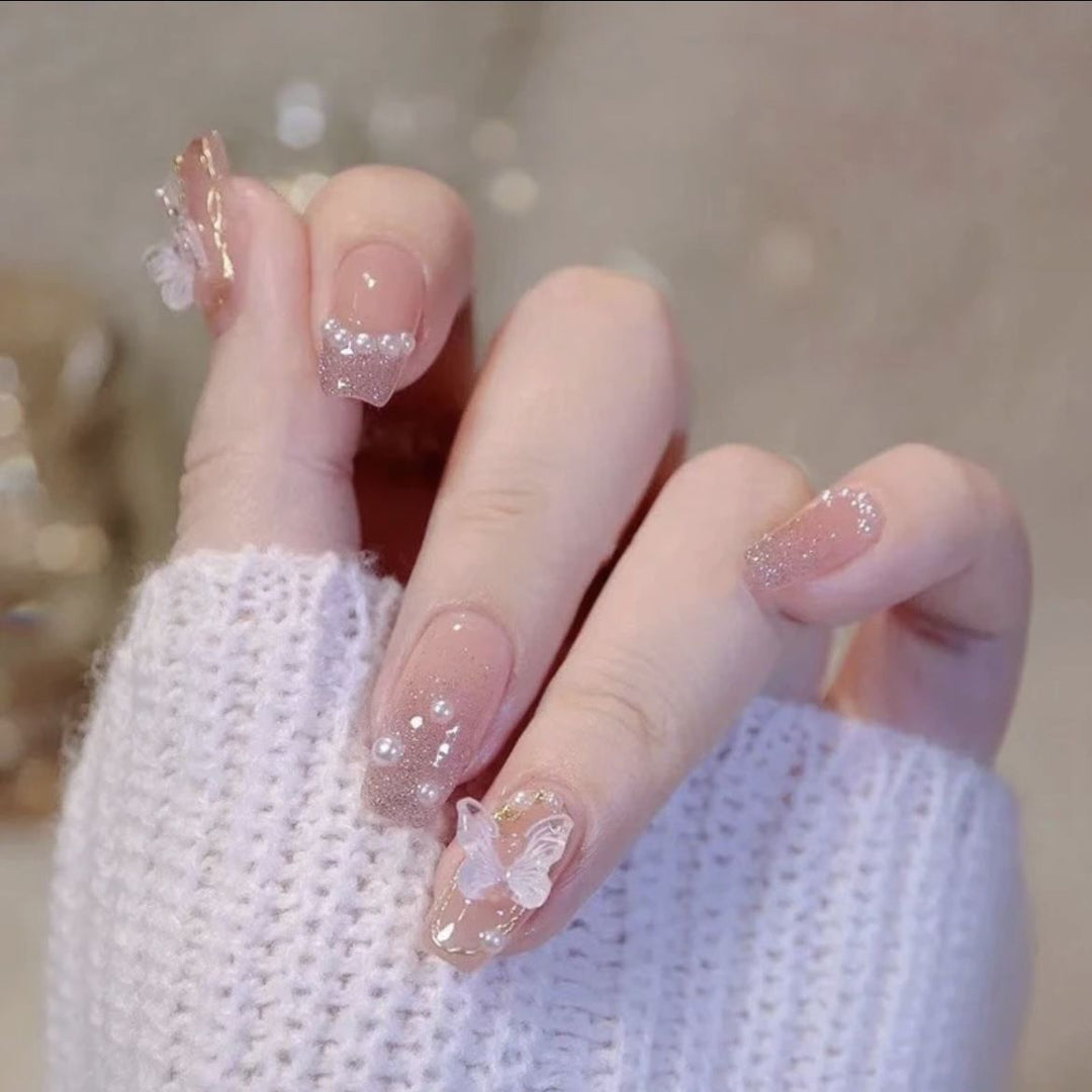 Artistic Nail Art with Glitter and Flower Applications Bowlift
