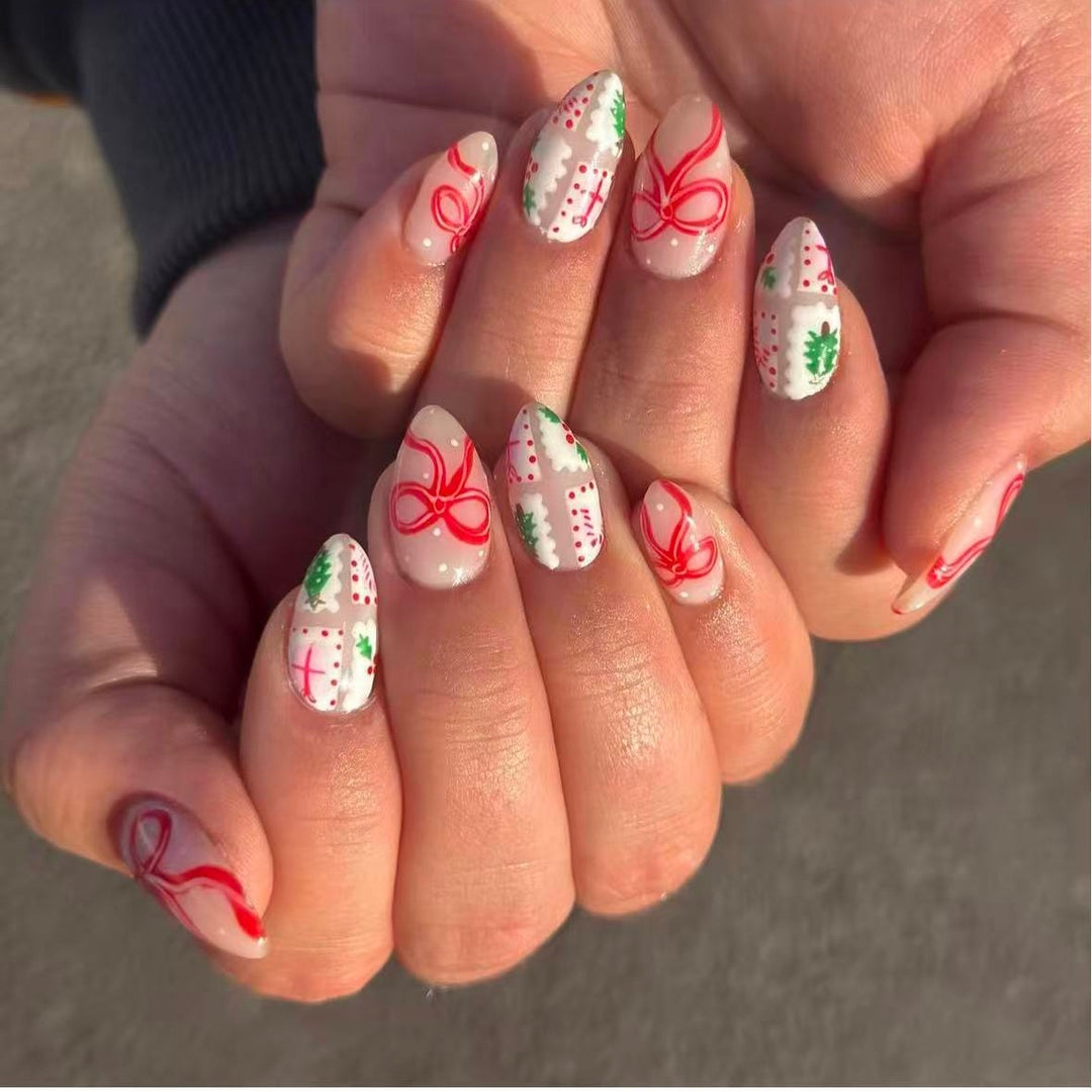 Artificial nail set with festive gift and bow motifs Bowlift