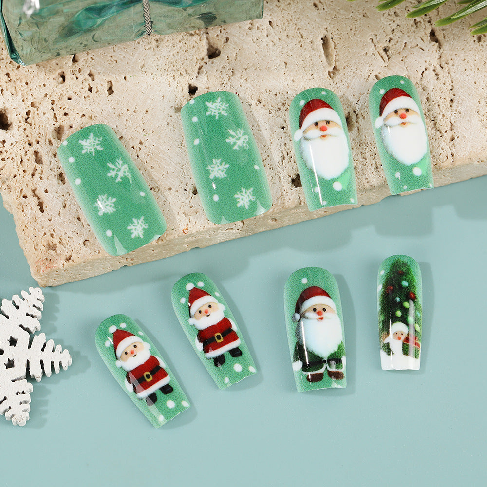 Glittering artificial nails in festive Christmas design Bowlift