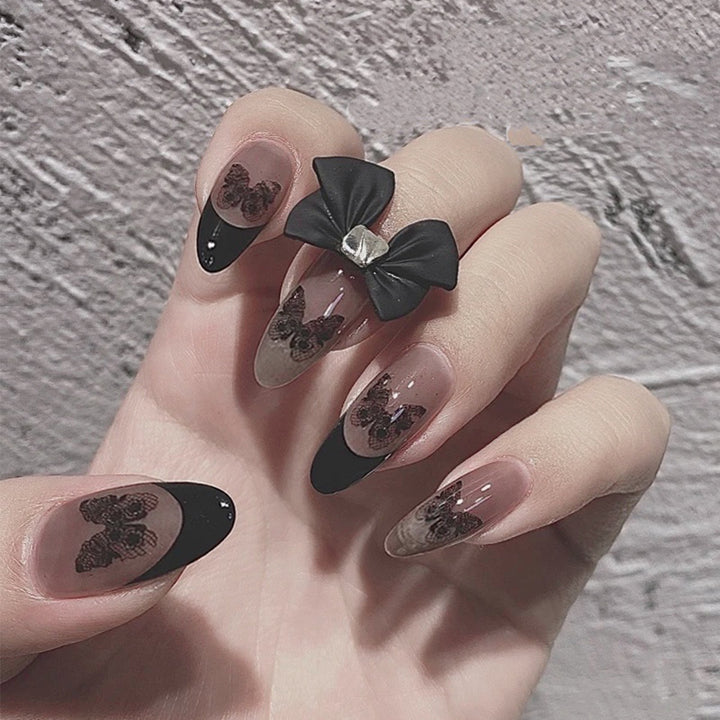 Artful nail art in Gothic style with butterfly motifs Bowlift