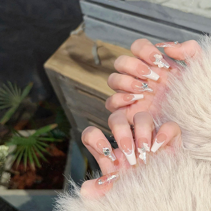 Glamorous artificial nails with glitter design Bowlift