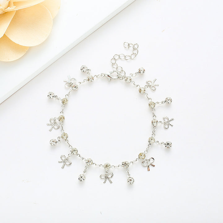 Crystal Bow Charm Bracelet Bowlift