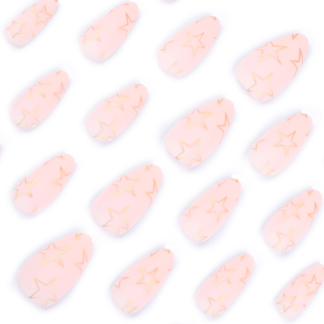 Artful Nail Art with Golden Star Motifs Bowlift