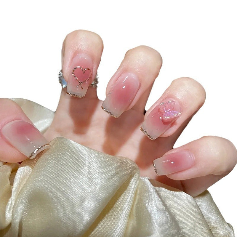 Artificial art nails with heart and glitter elements Bowlift