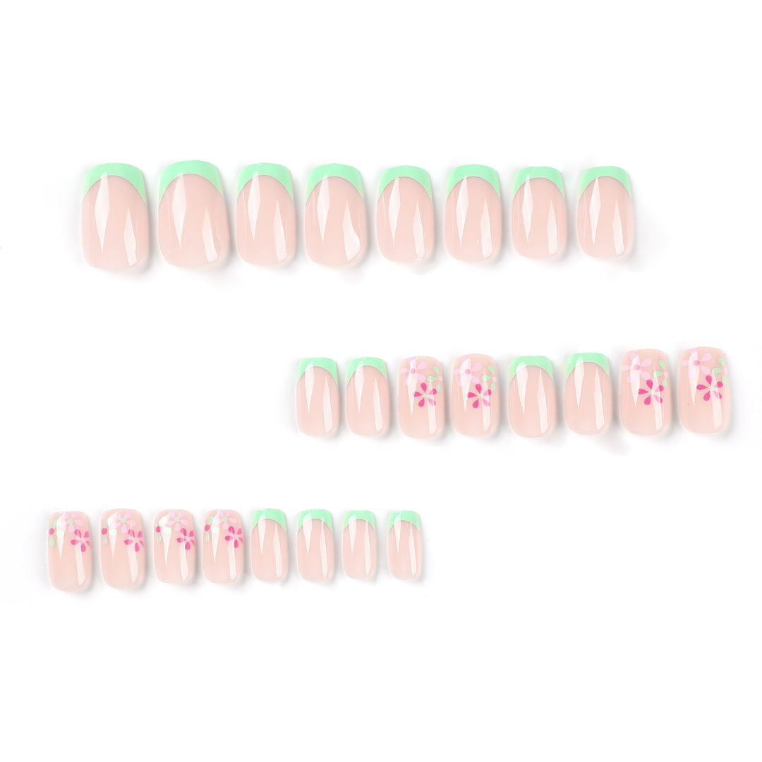 Artificial nails with floral accents and neon tips Bowlift