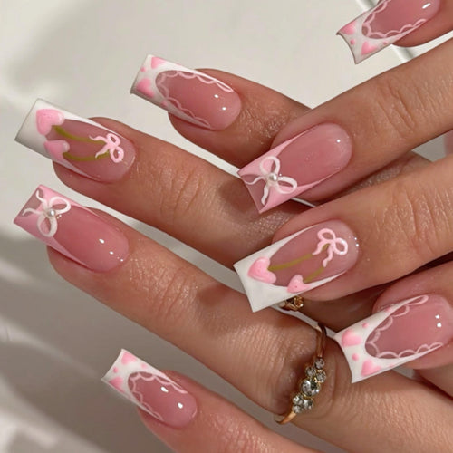 Artistic Nail Extensions with Playful Floral Design Bowlift