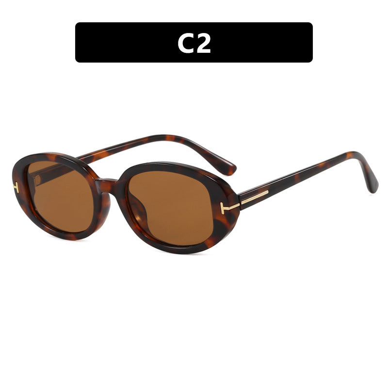 Ladies stylish oval sunglasses with golden details Bowlift