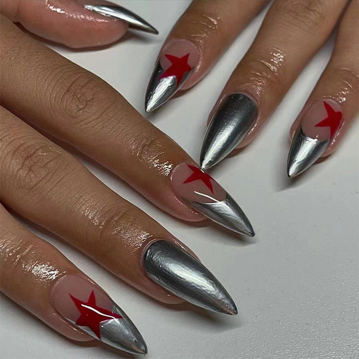 Artful stiletto nails with silver and star motifs Bowlift
