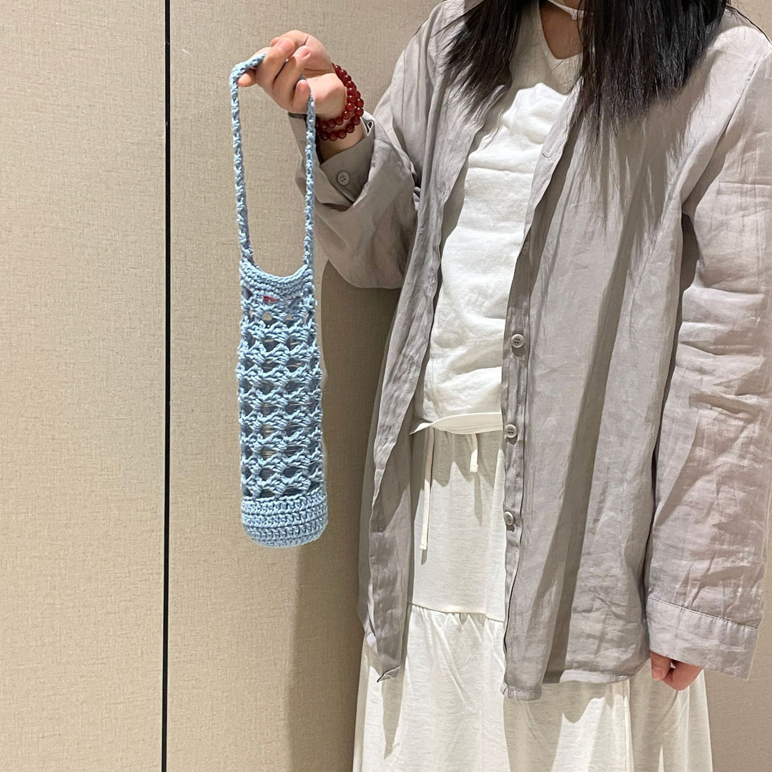 Hand-knotted bottle carrier Bowlift