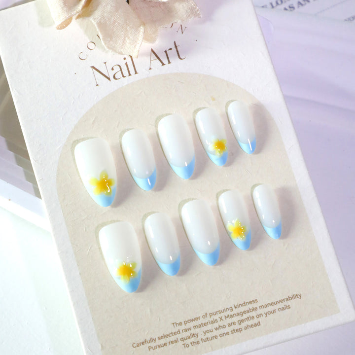 Artfully designed nail extensions with floral accent Bowlift