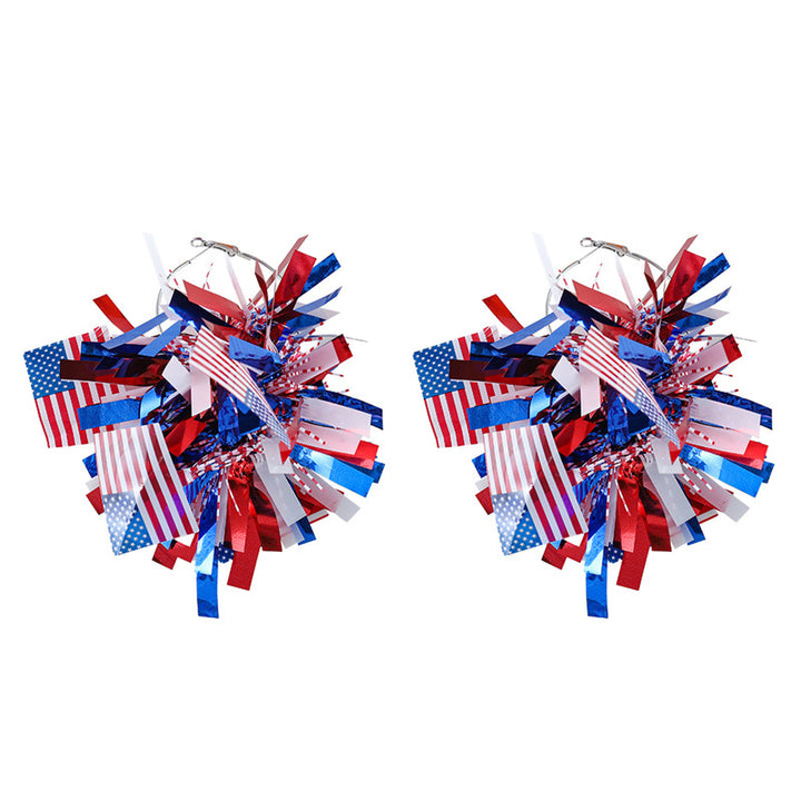 Women with eye-catching pompom hoops with lametta tassels and lightweight wire closure Bowlift