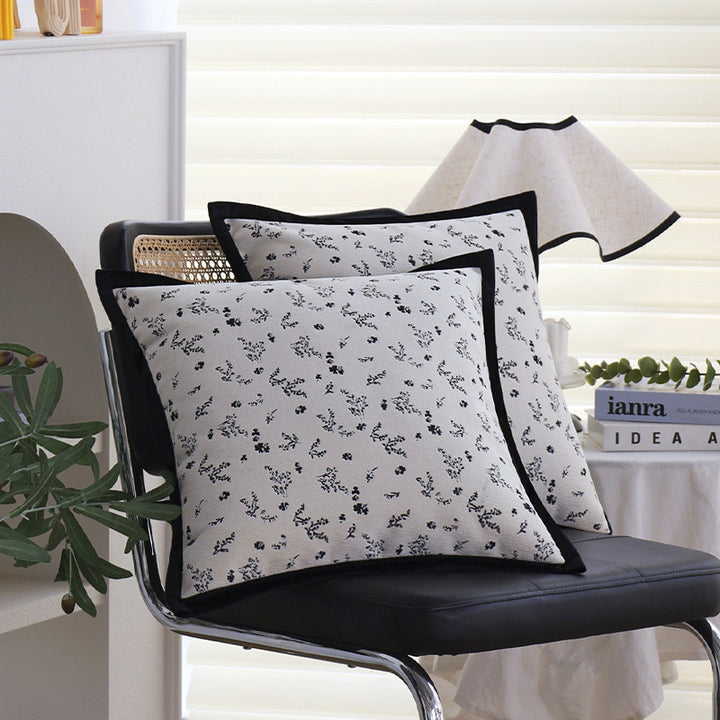 Square decorative cushion cover with subtle floral jacquard texture and elegant piping Bowlift