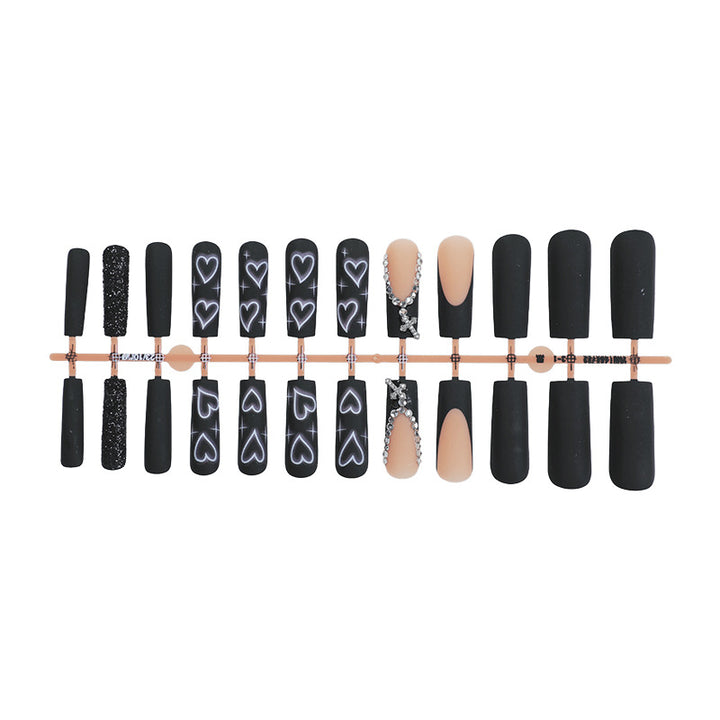Artificial nail set with elegant glitter and heart designs Bowlift