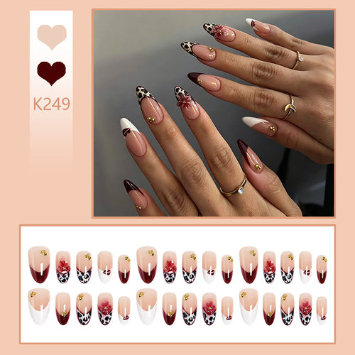 Artificial nail set with elegant floral patterns and glamorous details Bowlift