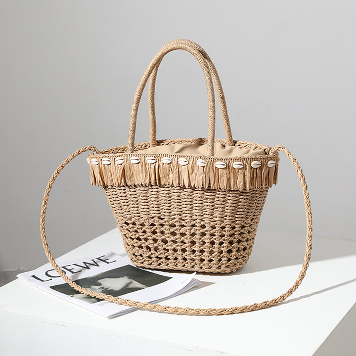 Braided straw bag with decorative tassel detail Bowlift