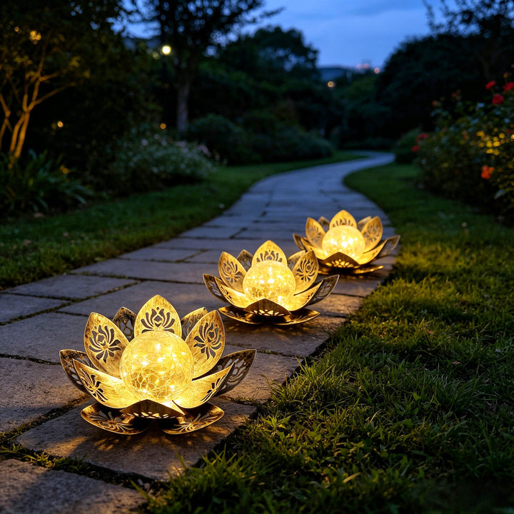 Decorative lotus solar garden light with antique metal petals and cracked glass globe Bowlift
