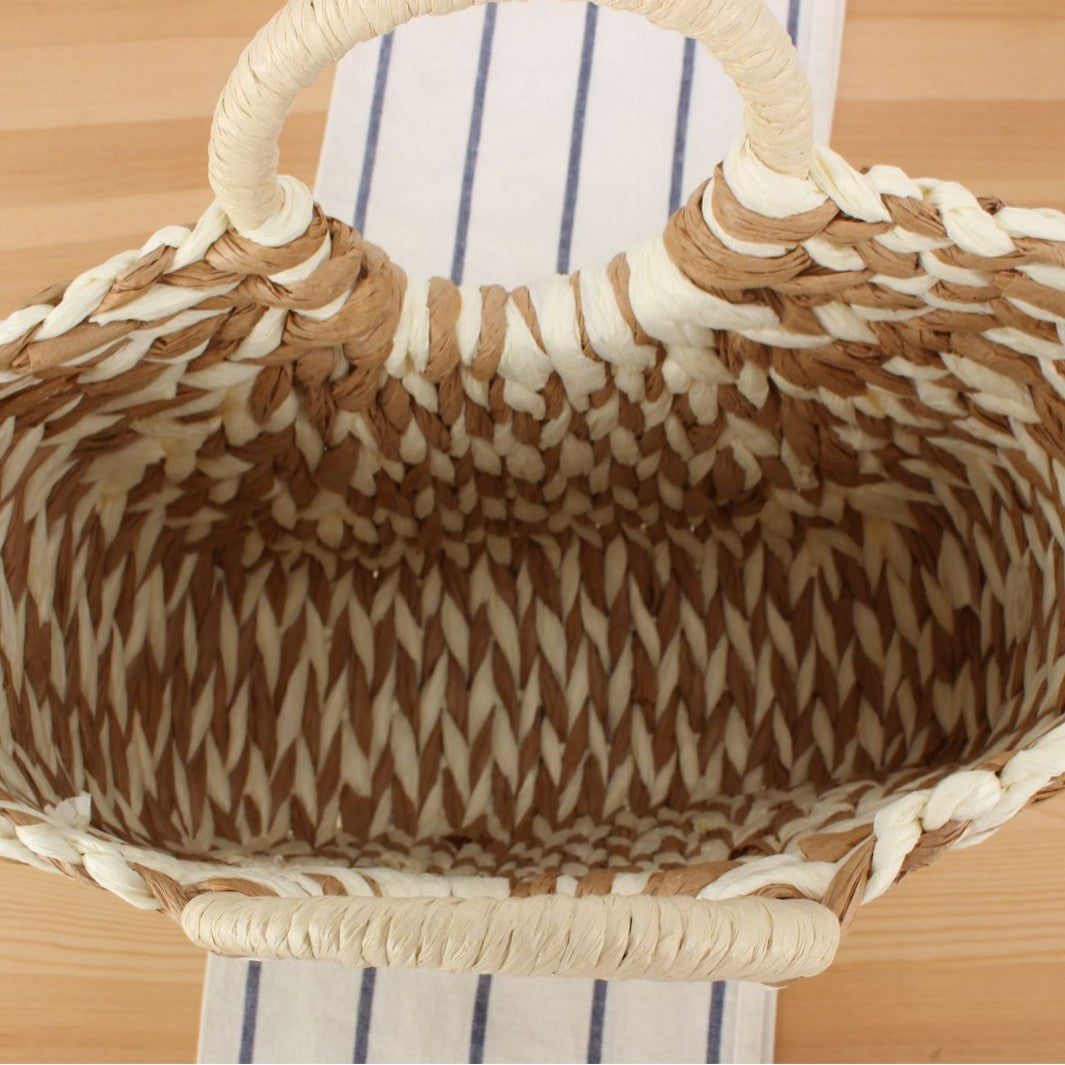 Wicker bag in modern design with artistic weaving Bowlift