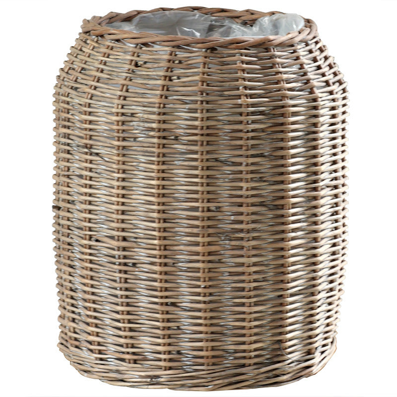 Stylish laundry basket made of braided natural material Bowlift