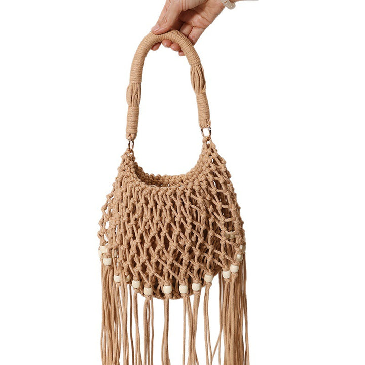 Macrame bag with decorative fringes and wooden beads Bowlift