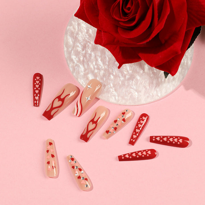 Artful Nail Art with Hearts and Glitter Accents Bowlift
