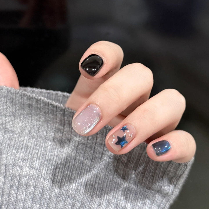 Artificial nails with elegant star design and shimmering effects Bowlift