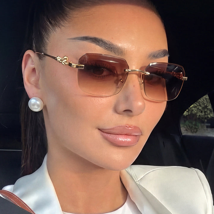 Women's fashionable square sunglasses with elegant gold frame and protective UV filter Bowlift
