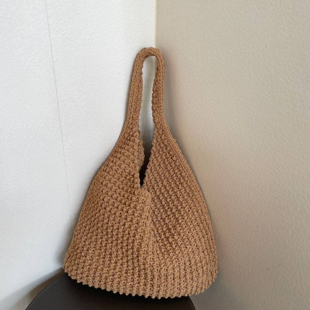 Hand-knotted everyday bag with structured surface Bowlift