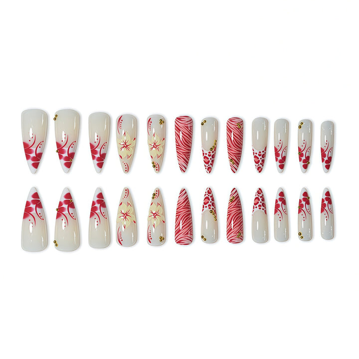 Elegant Stiletto Nail Enhancements with Floral and Animal Print Designs Bowlift