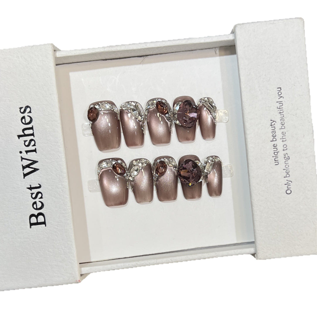 Decorative Press-On Nail Design with Gemstone Accents Bowlift