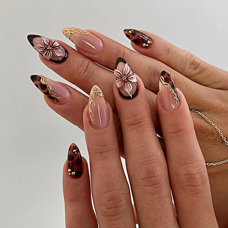 Artificial nail set with elegant floral decor and glitter elements Bowlift
