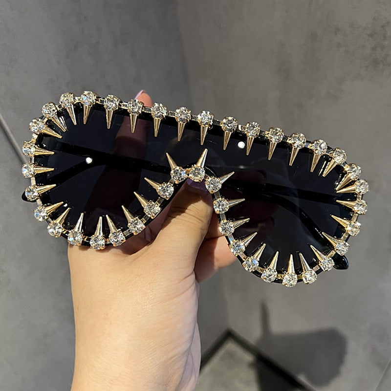 Ladies extravagantly designed cat-eye sunglasses with glitter accents Bowlift