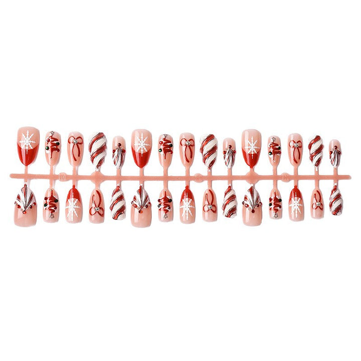 Artificial nail set with festive Christmas motifs and elegant decorations Bowlift