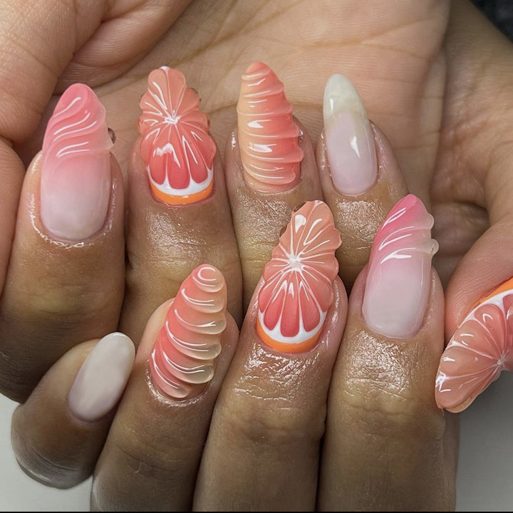 Creative nail set with subtle ombre effects and elegant decorative elements Bowlift