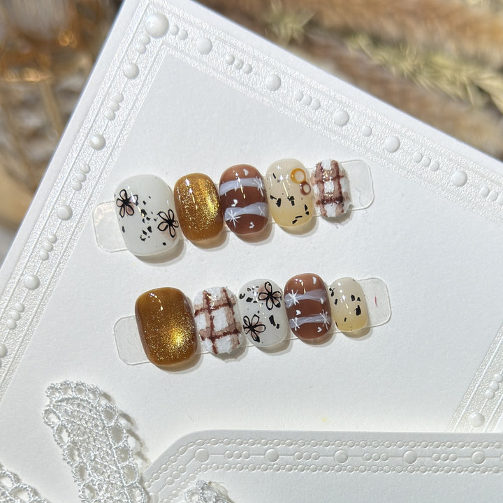 Artistic Press-On Nail Set with Unique Design Elements Bowlift