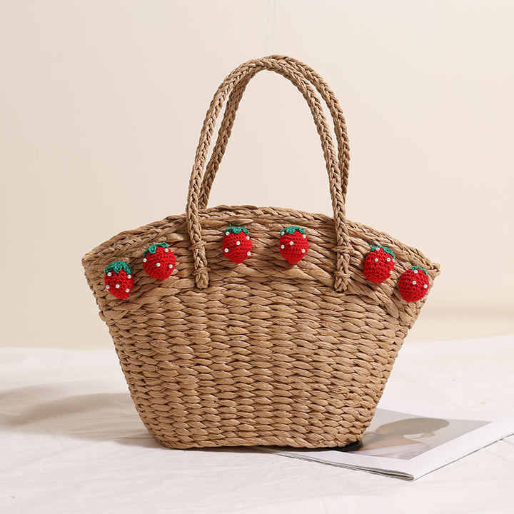 Handmade basket bag with playful strawberry motif Bowlift