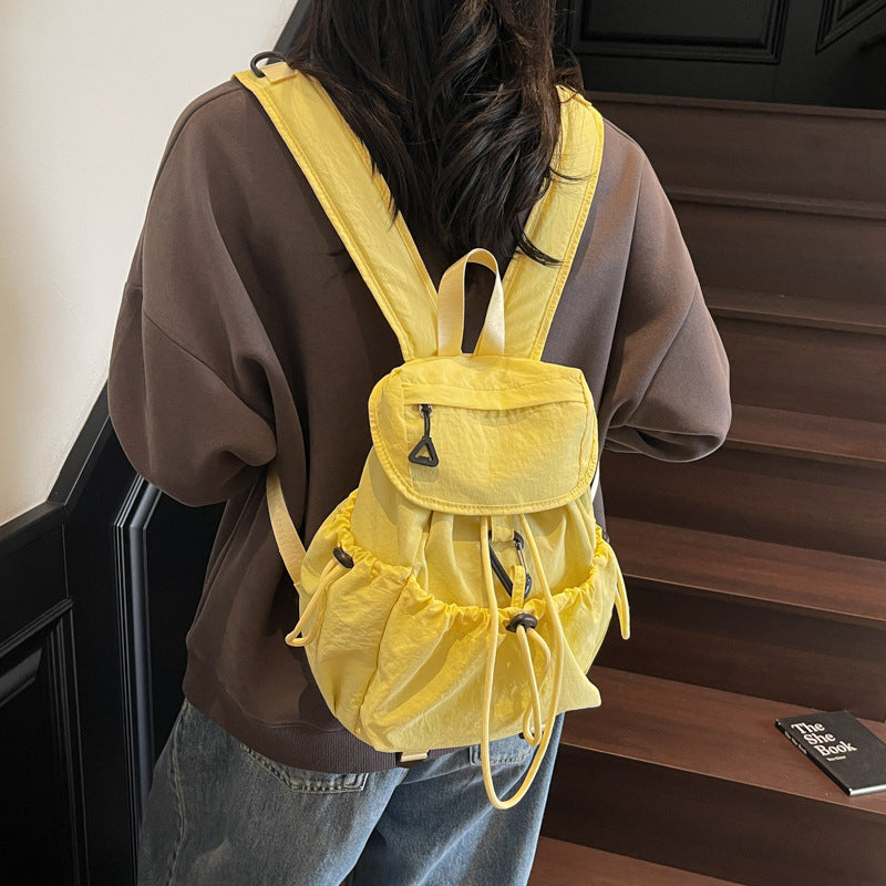 Leisure backpack with elastic drawstring and practical side pockets Bowlift