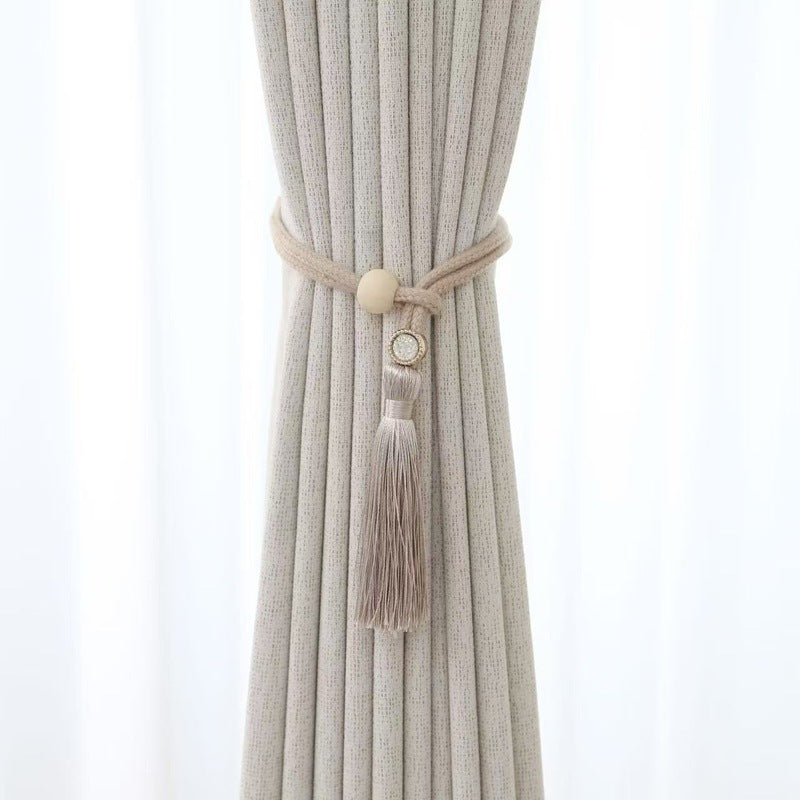 Elegant curtain tieback with tassels Bowlift